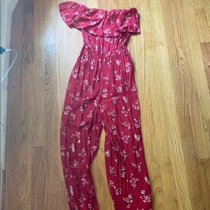 Red strapless romper with pockets